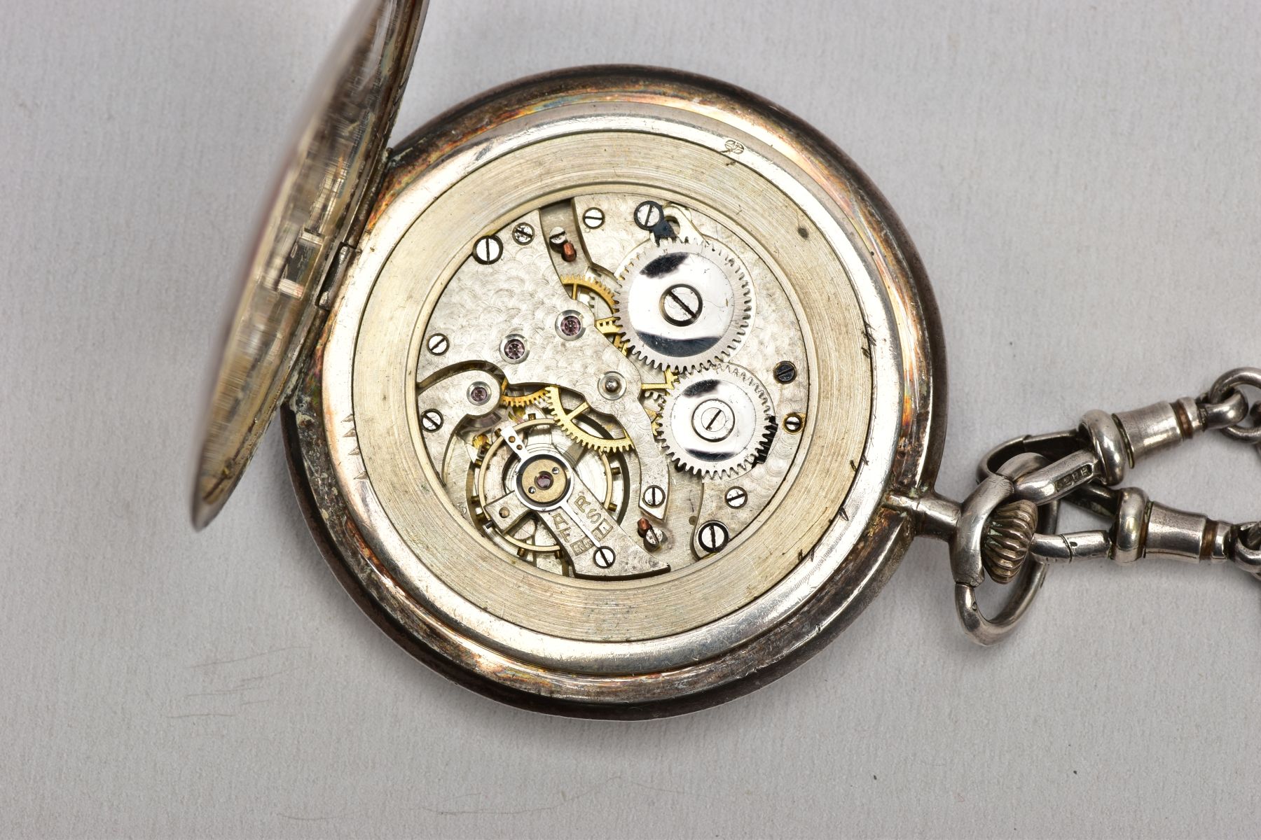 A SILVER OPEN FACE POCKET WATCH WITH AN ALBERT CHAIN AND A FOB MEDAL, round engine turned design - Image 5 of 7