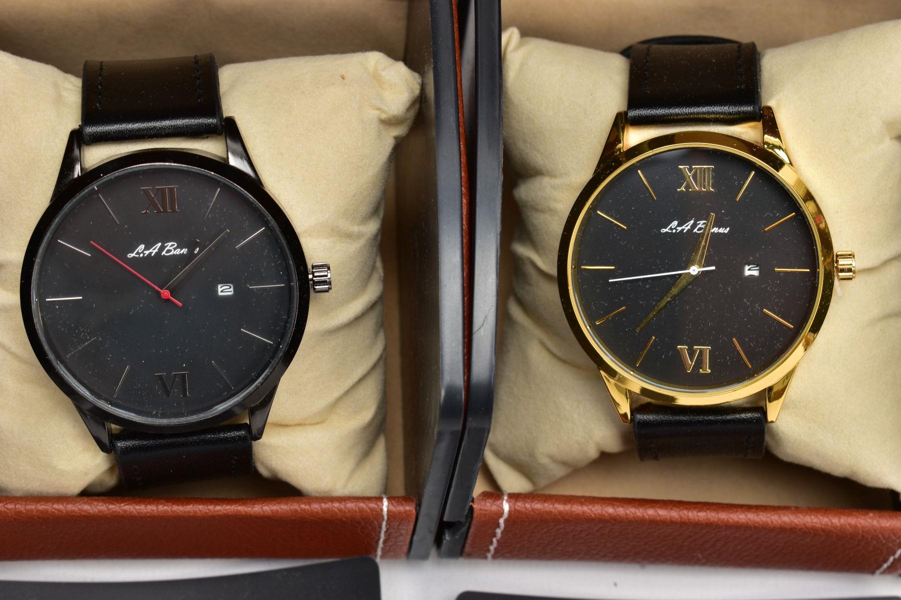 FOUR BOXED 'L. A. BANUS' WRISTWATCHES, two matching with round black dials Roman twelve and six - Image 2 of 4