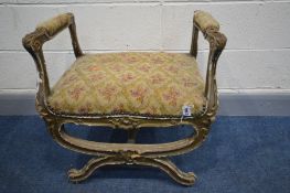 A LOUIS XVI STYLE GILTWOOD SAVONAROLA STOOL, with open armrests, width 60cm x depth 46cm x height