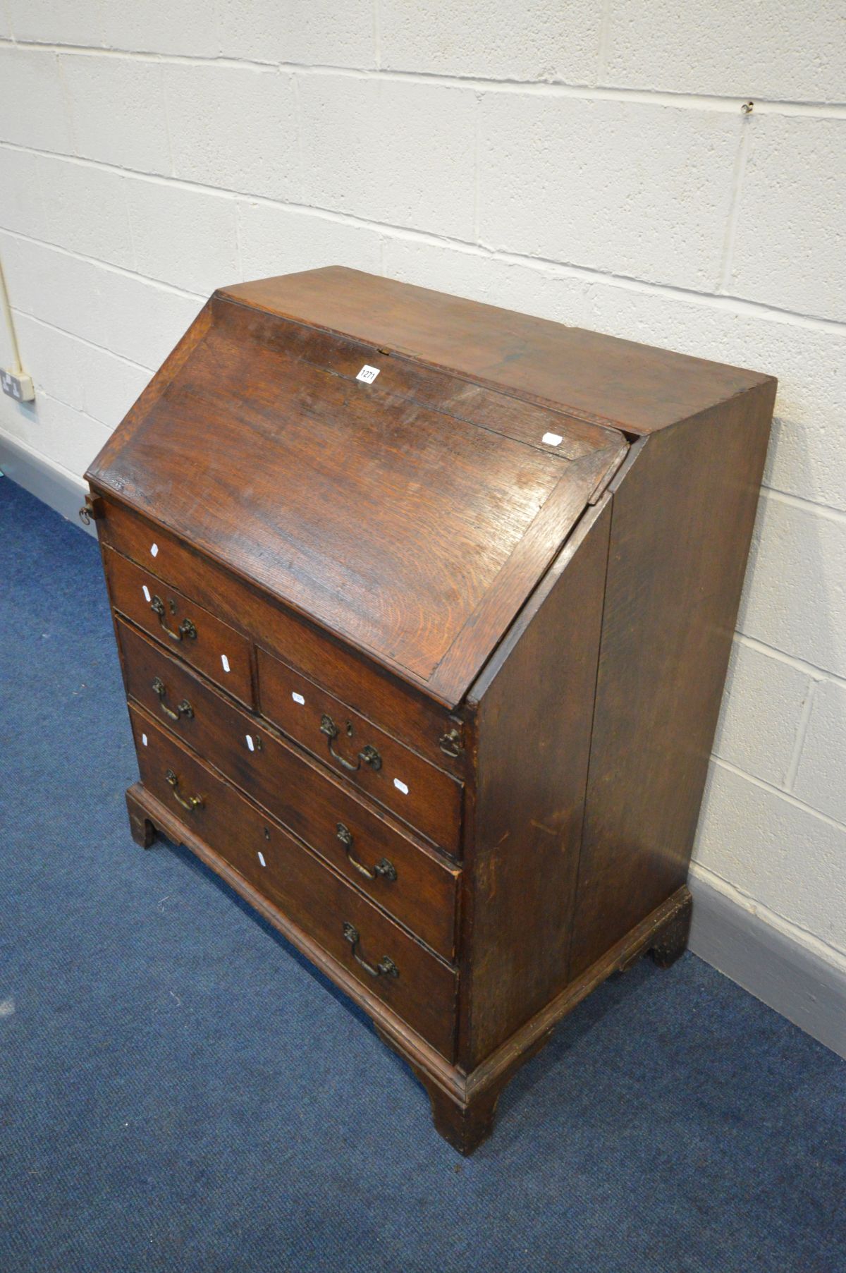 A GEORGIAN OAK BUREAU, the fall front enclosing a fitted interior, two short over two long - Image 3 of 4