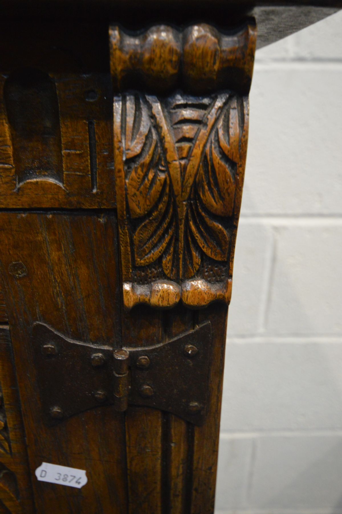 A REPRODUCTION OAK FOUR DOOR DRINKS CABINET, the arched panel door enclosing an arched shelf, and - Image 2 of 8