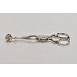 A PAIR OF SILVER GEORGE III SUGAR TONGS, circa 1765, scroll detailed handles with shell shaped