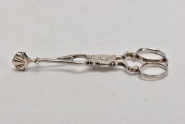 A PAIR OF SILVER GEORGE III SUGAR TONGS, circa 1765, scroll detailed handles with shell shaped