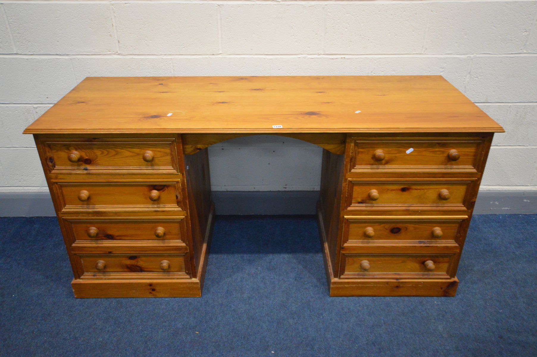 A PITCH PINE DESK with six assorted drawers, width 160cm x depth 60cm x height 77cm