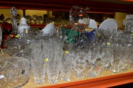 OVER EIGHTY PIECES OF CUT GLASS AND CRYSTAL to include a Dartington Crystal jug with box,