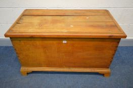 A PINE BLANKET CHEST, on bracket feet, width 105cm x depth 55cm x height 62cm (condition - top