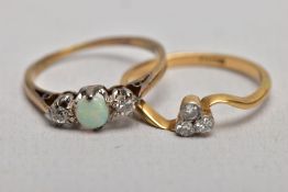 TWO YELLOW METAL DIAMOND SET RINGS, the first set with three old cut diamonds, within collet mounts,
