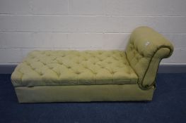 AN UPHOLSTERED AND BUTTONED DAY BED, with a drop end