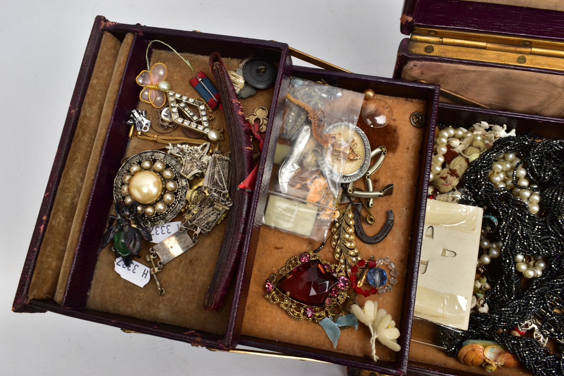 A HINGED BOX OF MAINLY COSTUME JEWELLERY, to include a jet book charm engraved with a church and - Image 4 of 9