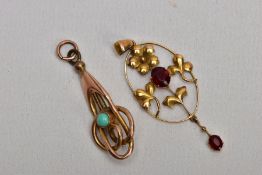 TWO EDWARDIAN 9CT GOLD PENDANTS, the first of elongated intertwining design set with a central