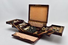A HINGED BOX OF MAINLY COSTUME JEWELLERY, to include a jet book charm engraved with a church and