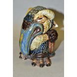 AN ANDREW HULL POTTERY STONEWARE GROTESQUE BIRD JAR AND COVER, predominantly in brown, green, blue