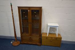 AN OAK TWO DOOR DISPLAY CABINET, width 84cm x depth 30cm x height 158cm and a teak effect cabinet,