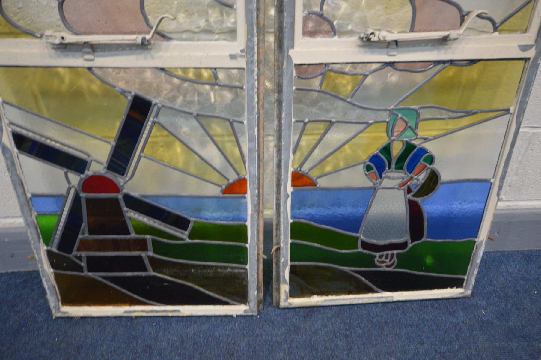 A PAIR OF EARLY 20TH CENTURY STAINED GLASS WINDOWS depicting a Dutch seascape with a windmill, - Image 5 of 7