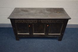 A GEORGIAN OAK COFFER, with triple front panels, and a candle box, width 121cm x depth 49cm x height