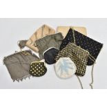 FOUR EVENING BAGS AND FIVE PURSES, to include a black and gold colour flower detailed bag fitted