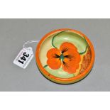 A CLARICE CLIFF BIZARRE 'NASTURTIUM' PATTERN PIN DISH, orange and yellow bands to the exterior,