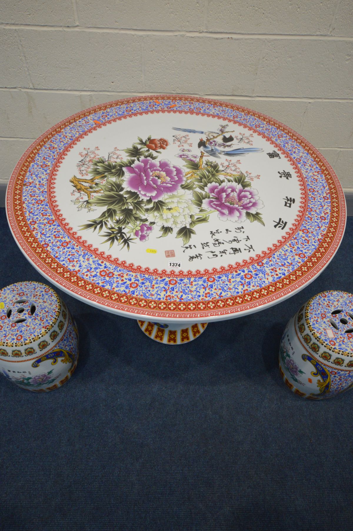 AN ORIENTAL PORCELAIN CIRCULAR TABLE, on a pedestal base, with chinoiserie decoration and majority - Image 2 of 8