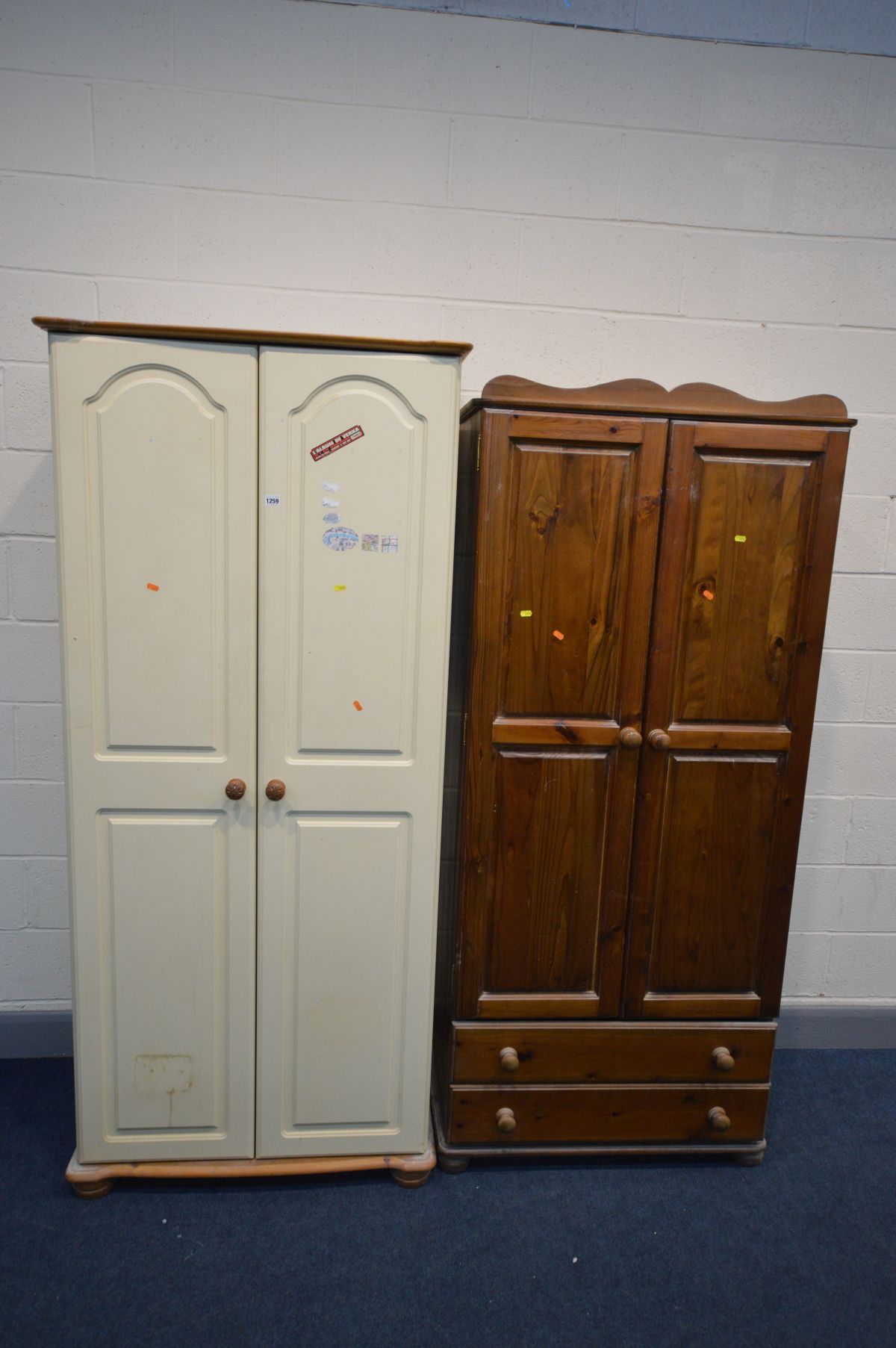 A PINE DOUBLE DOOR WARDROBE, with two long drawers, width 82cm x depth 53cm x height 195cm and a