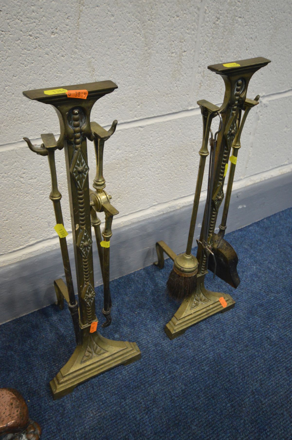 A PAIR OF COPPER ANDIRONS, and another pair of brass andirons with four fire irons (4) - Image 3 of 3