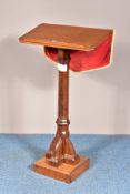 A 20TH CENTURY OAK ECCLESIASTICAL LECTURN, with fabric pulpit fall, height 124cm