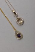 TWO 9CT GOLD GEM SET PENDANT NECKLACES, the first pendant of a tear drop shape, set with a central