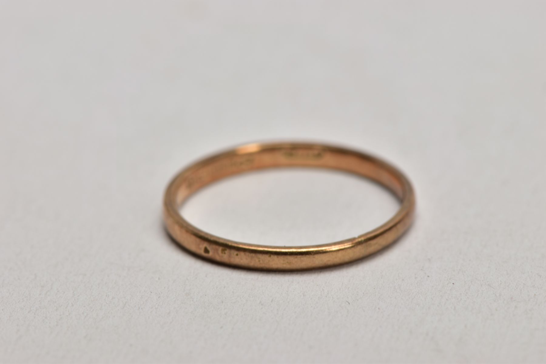 TWO 9CT GOLD RINGS AND A YELLOW METAL GARNET SET STICK PIN, the first a thin plain polished band, - Image 4 of 8