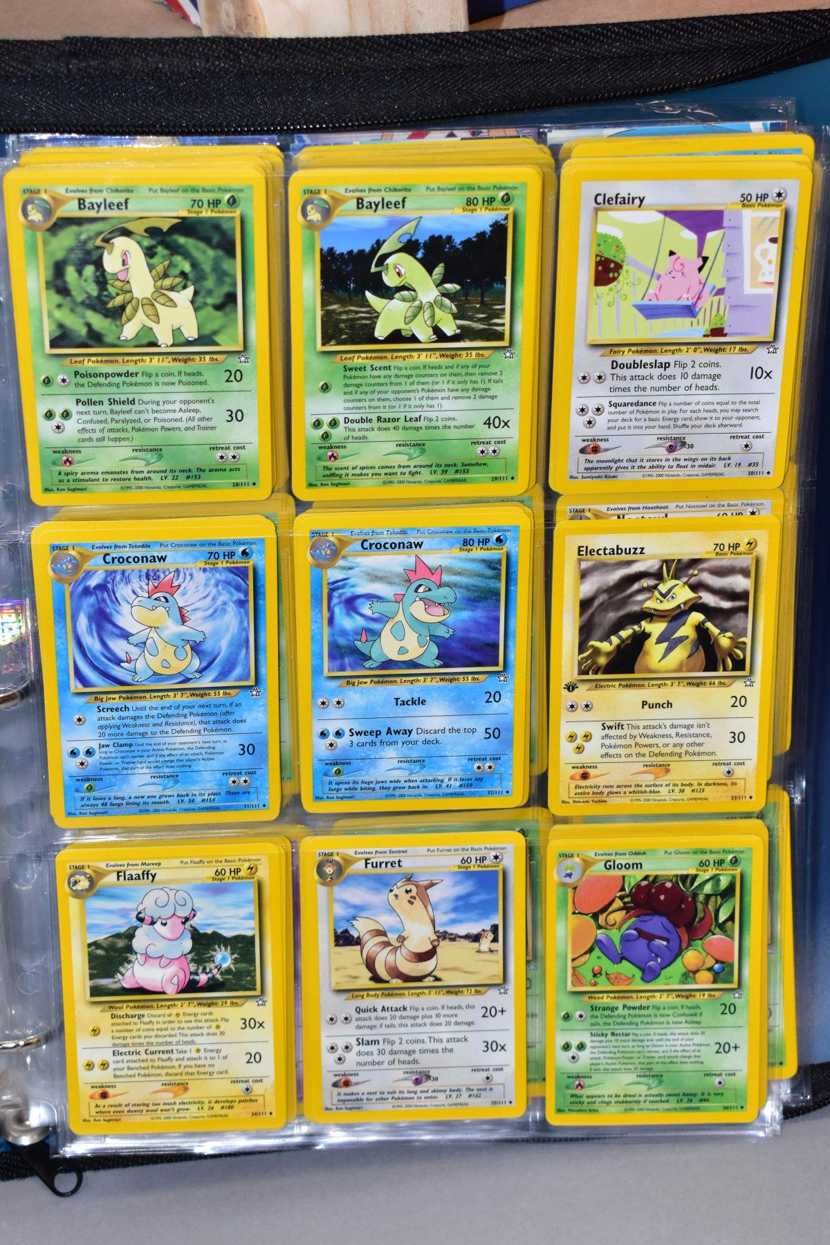 A BLUE POKEMON FOLDER CONTAINING AN ALMOST COMPLETE NEO GENESIS SET, which includes first - Bild 16 aus 33