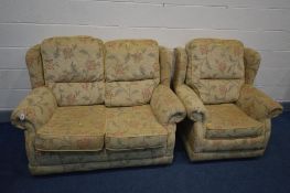 A FLORAL UPHOLSTERED TWO PIECE LOUNGE SUITE, comprising a sofa and an armchair