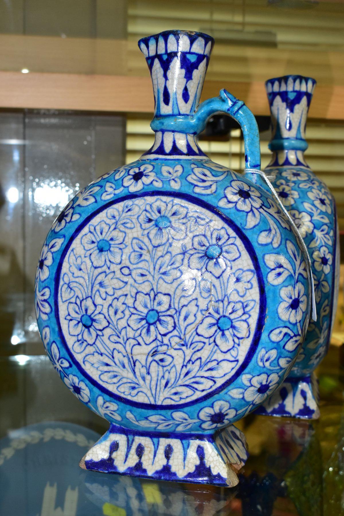 A PAIR OF LATE 19TH/EARLY 20TH CENTURY IZNIK STYLE EWERS, of moon flask form, the turquoise and blue - Image 7 of 8