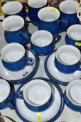 NINETEEN PIECES OF DENBY IMPERIAL BLUE MUGS, CUPS AND SAUCERS, comprising five coffee mugs, seven