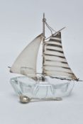 A 20TH CENTURY NOVELTY GLASS AND STERLING SILVER CRUET IN THE FORM OF A SAILING BOAT, one moveable
