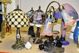 SIX VARIOUS COLOURED GLASS TABLE LAMPS, four with domed leaded glass shades, the other two of Art