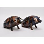 TWO EARLY 20TH CENTURY DENBY MAJOLICA GLAZE PIG MONEY BOXES, one marked Peter 1924 (old damage to