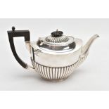 A LATE VICTORIAN SILVER TEAPOT, tapered stop reeding design to the body and spout, ebonised handle