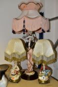 A FLORENCE GUISEPPE ARMANI FIGURAL TABLE LAMP AND A PAIR OF CAPODIMONTE TABLE LAMPS, the Florence