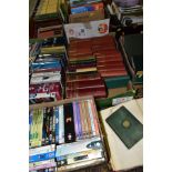 BOOKS AND DVDS, approximately one hundred and ten books and eighty DVDs in eight boxes, books titles