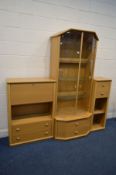 A MODERN LIGHT OAK GLAZED TWO DOOR DISPLAY CABINET with canted front corners three glass shelves