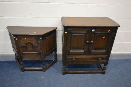 A DARK ERCOL ELM TWO DOOR CABINET with a single drawer, width 79cm x depth 43cm x height 88cm