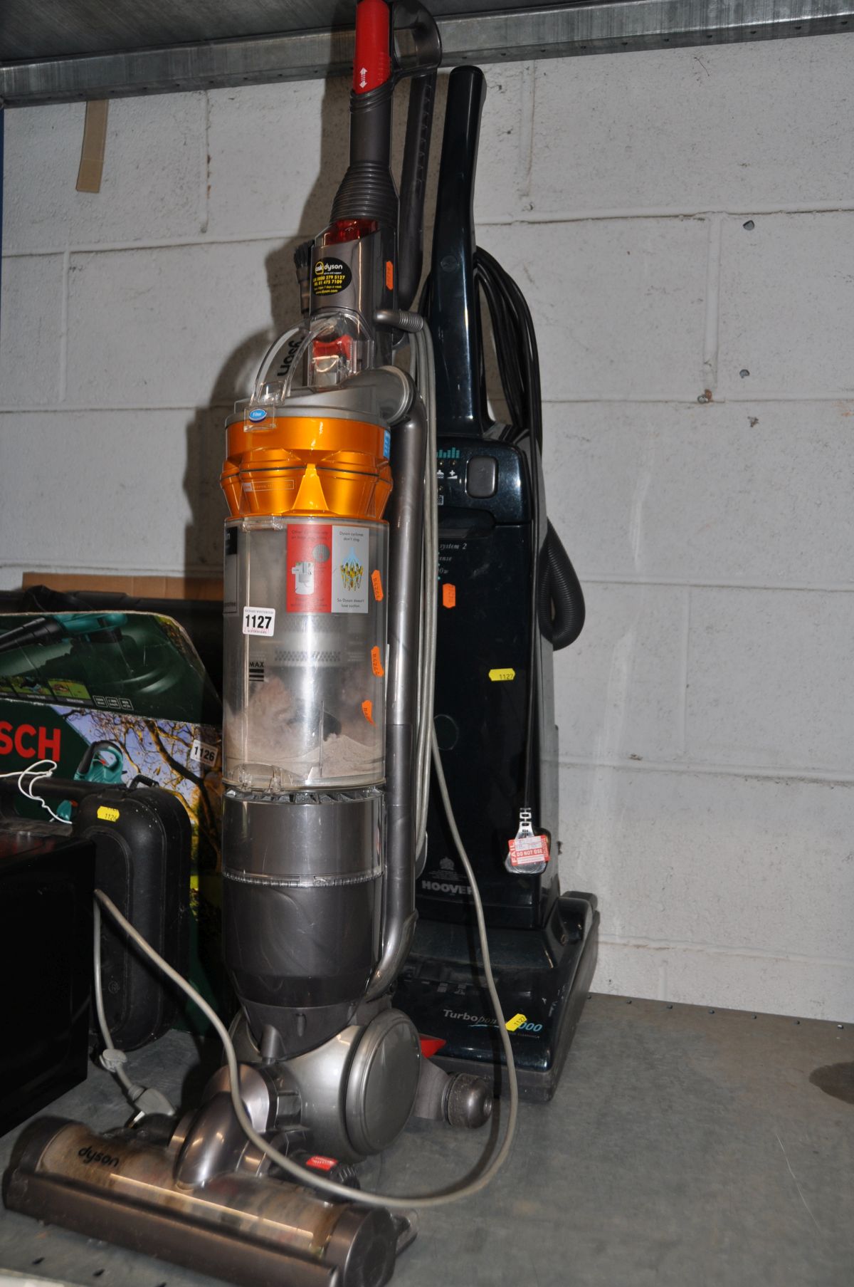 A DYSON DC18 SLIM UPRIGHT VACUUM CLEANER (PAT pass and working but brush bar not) and a Hoover