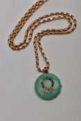 A VICTORIAN GEM SET PENDANT NECKLET, the pendant designed with a circular polished green
