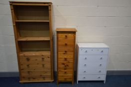 A PINE OPEN BOOKCASE with four drawers, width 80cm x depth 31cm x height 79cm along with a tall pine