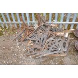 A QUANTITY OF VICTORIAN CAST IRON BRACKETS apparently to support an orangery roof