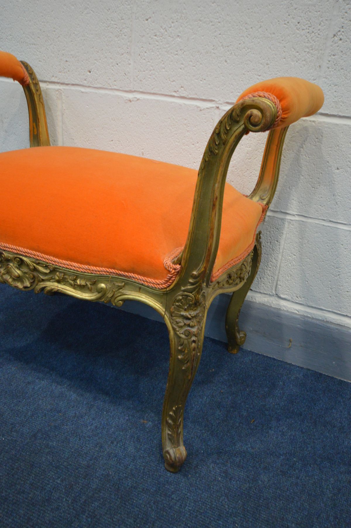 A LOUIS XV STYLE GILTWOOD STOOL, with open armrests, reupholstered in bright orange upholstery, - Image 2 of 3