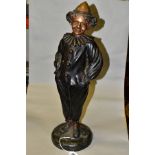 A 20TH CENTURY BRONZE FIGURE OF A CLOWN, wearing hat, nose, frilled collar, etc, cast standing on