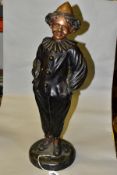 A 20TH CENTURY BRONZE FIGURE OF A CLOWN, wearing hat, nose, frilled collar, etc, cast standing on