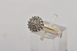 A 9CT GOLD DIAMOND CLUSTER RING, designed as four tiers of claw set single cut diamonds, estimated