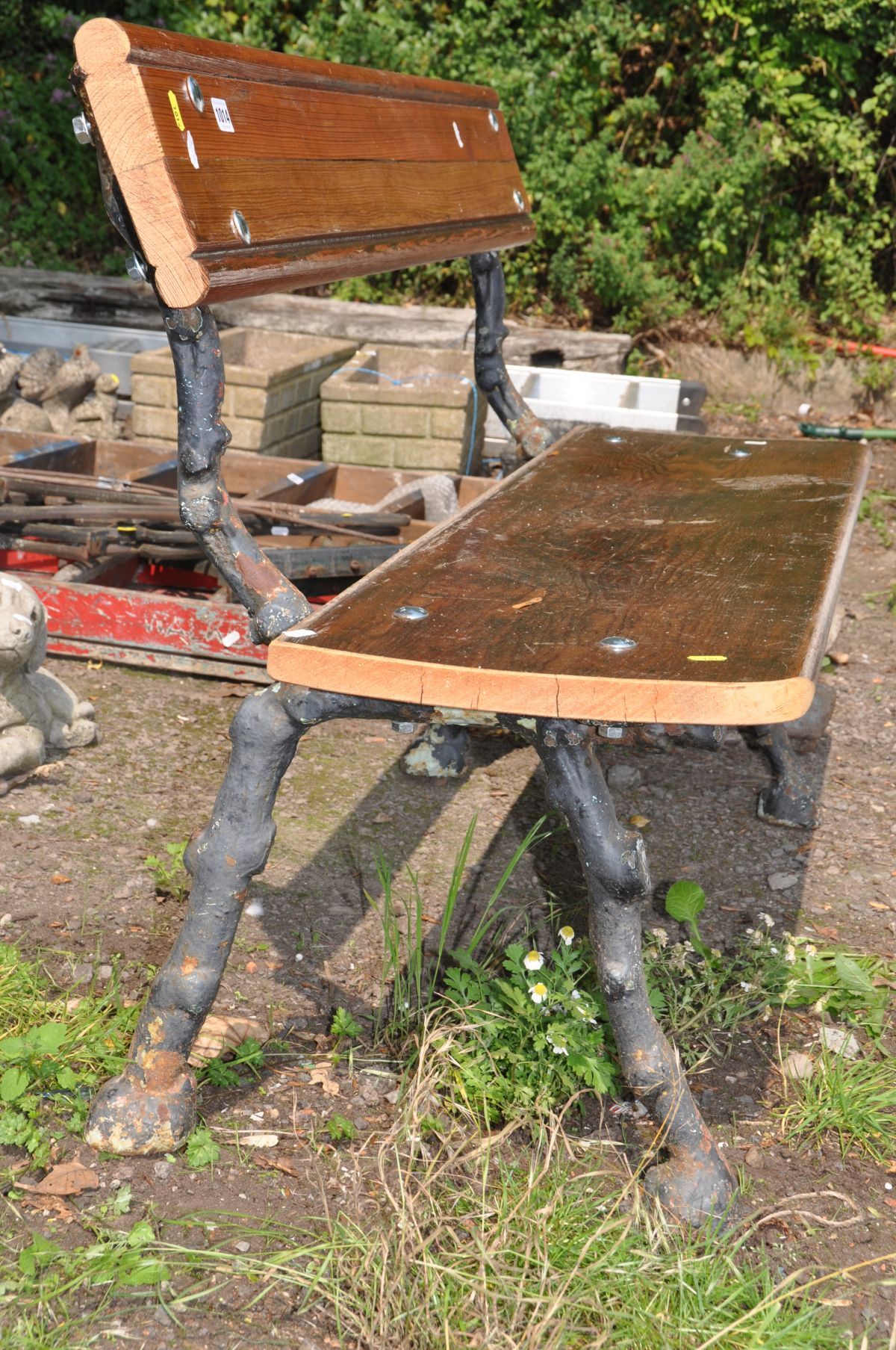 A CAST IRON GARDEN BENCH comprising of a pair of Victorian bench ends in the form of tree branches - Image 2 of 2