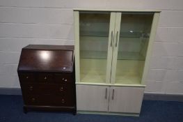 A STAG MINSTREL BUREAU, along with a double door bookcase (2)