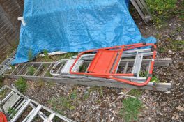 A SET OF ALUMINIUM DOUBLE EXTENSION LADDERS (each 2.9m long), and a pair of aluminium steps (3)